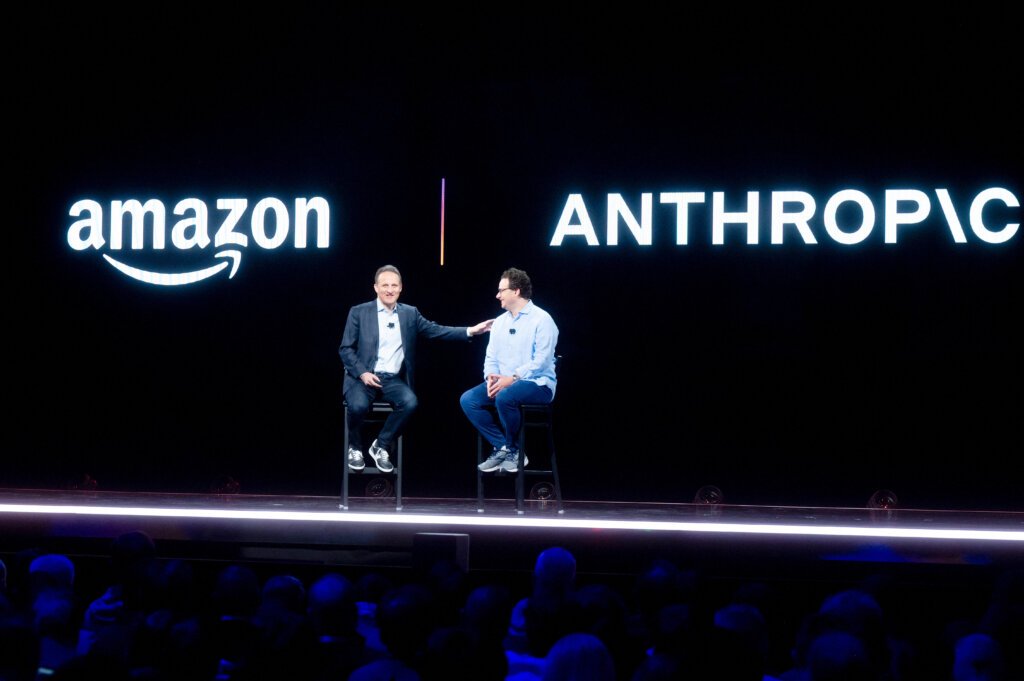 Amazon Web Services (AWS) CEO Adam Selipsky speaks with Anthropic CEO and co-founder Dario Amodei during AWS re:Invent 2023. (Image from AFP).
